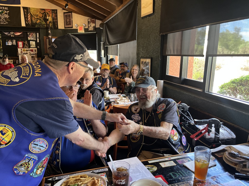 Chuck Emmett receiving his 25-year longevity award pin
